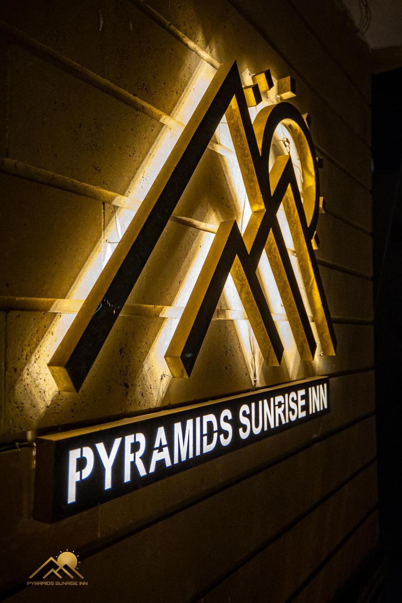Pyramids Sunrise מלון