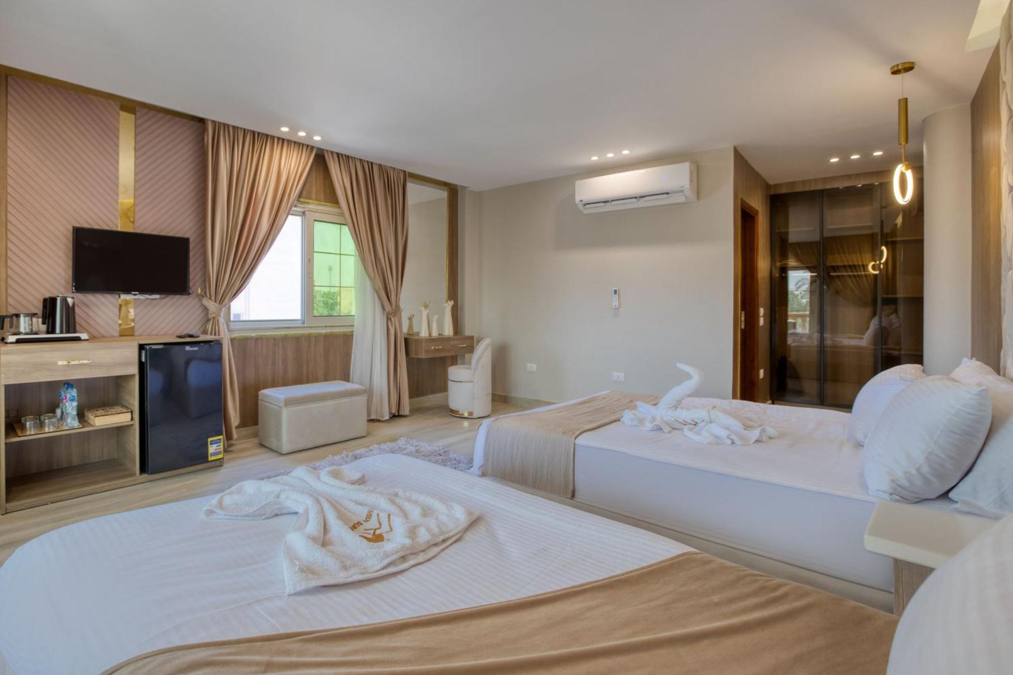 Отель Pyramids Sunrise Kafrat al Jabal